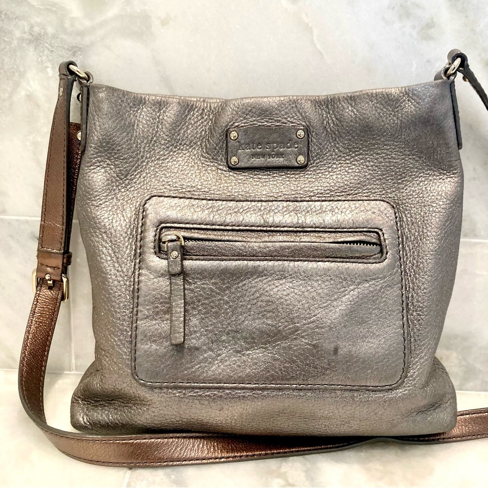 Kate Spade. Silver & Gold finished leather.